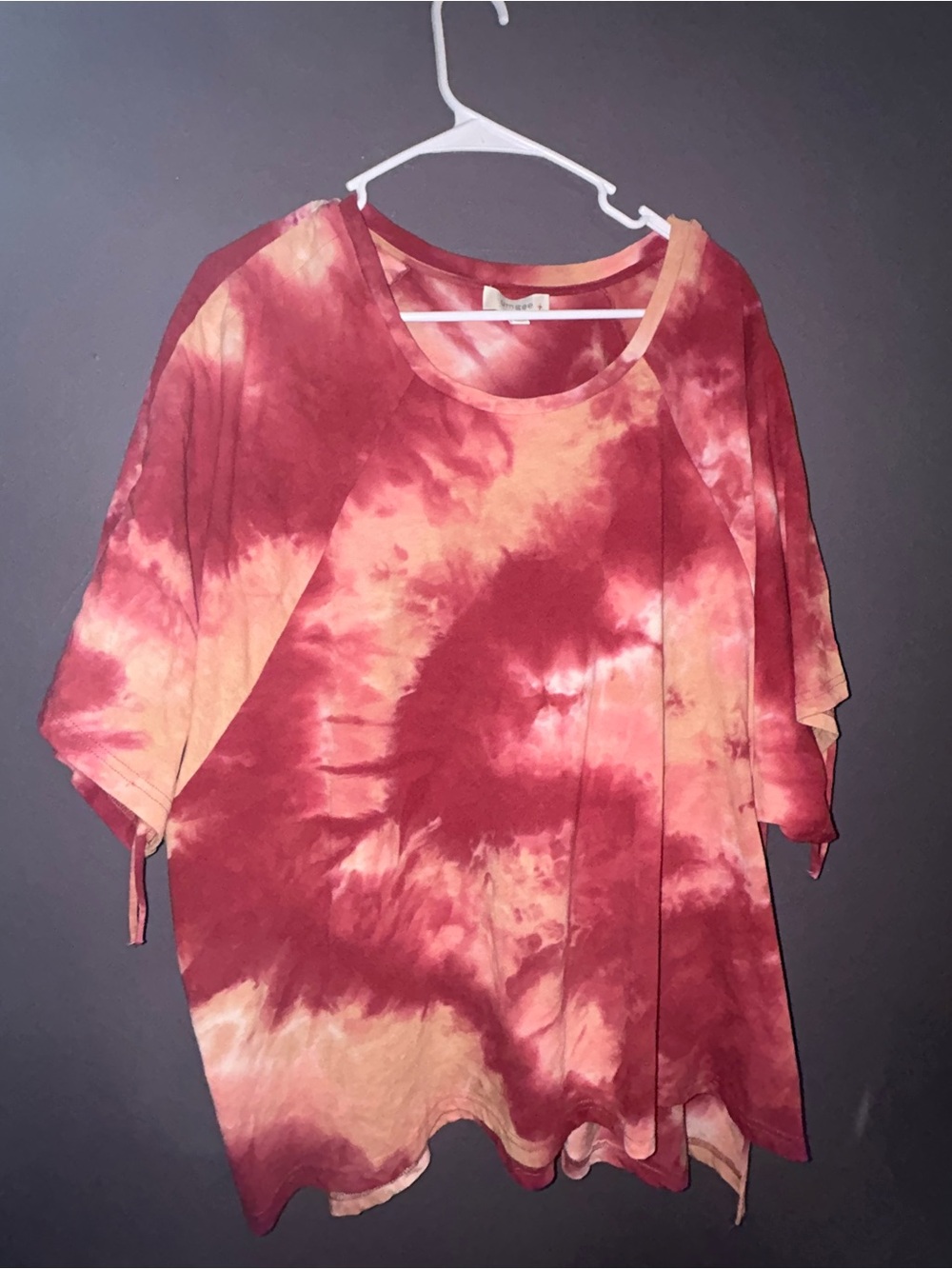 Umgee Tie-Dye Short Sleeve Top in Red and Peach. Oversized P2P is 29